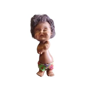 Vintage moody cutie rubber doll